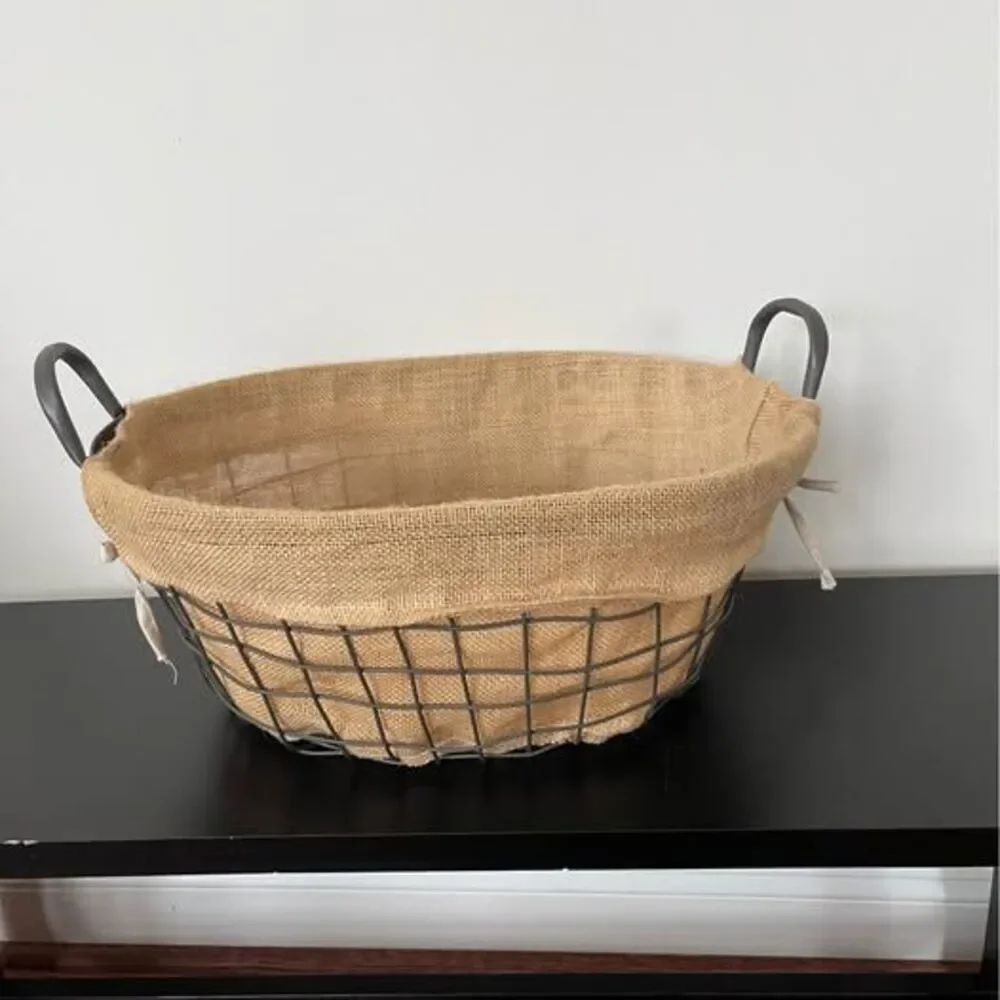 Large wire storage basket with burlap liner